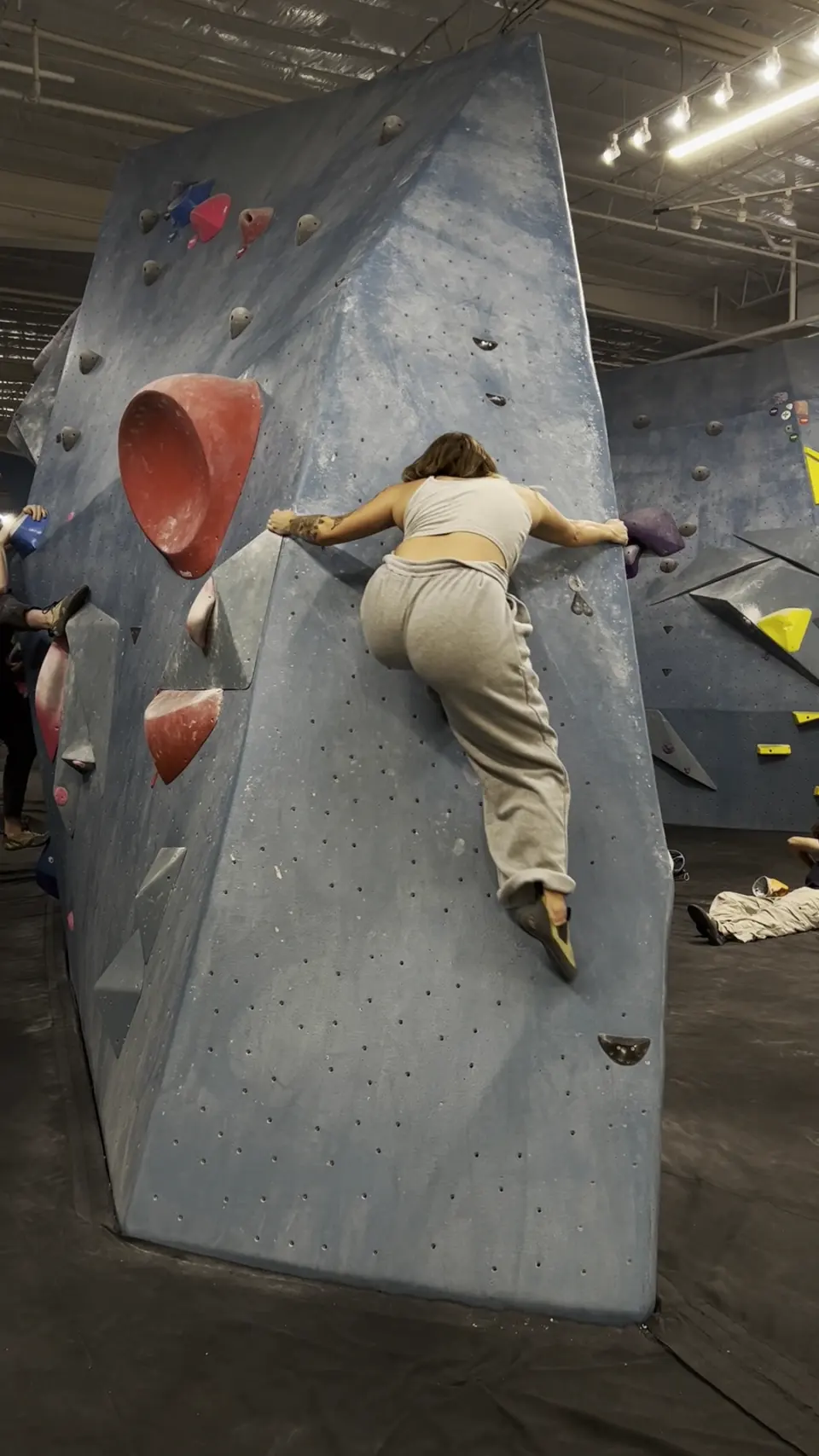 Climber working up a slab