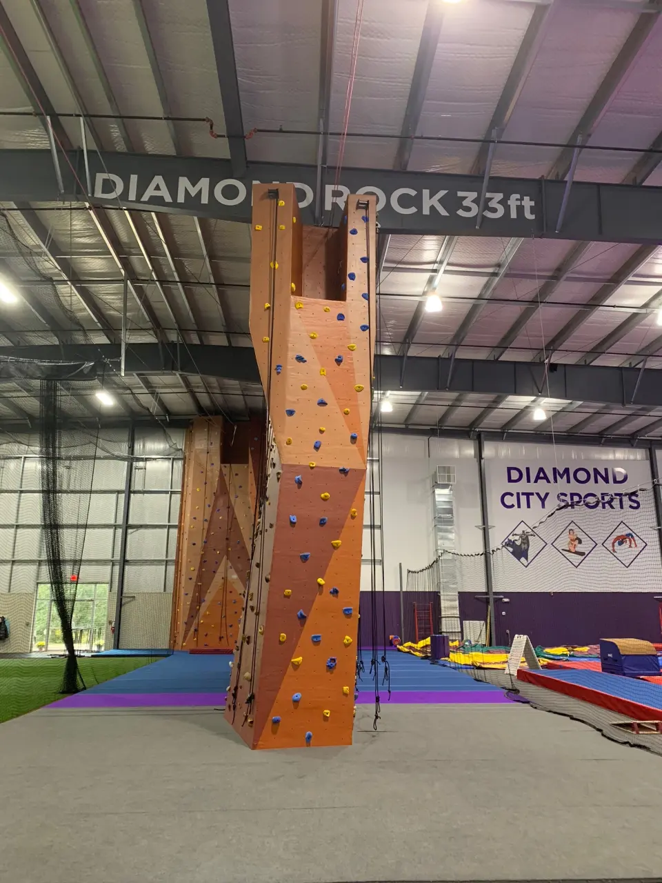 The 33-foot climbing tower under the Diamond Rock sign