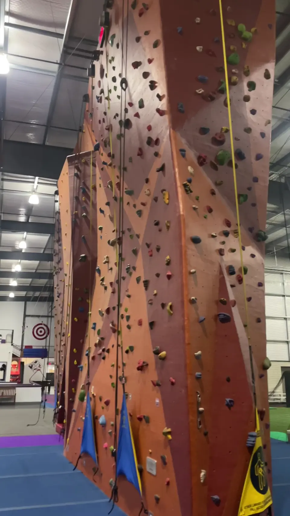 Top-rope lanes up the tall faceted wall