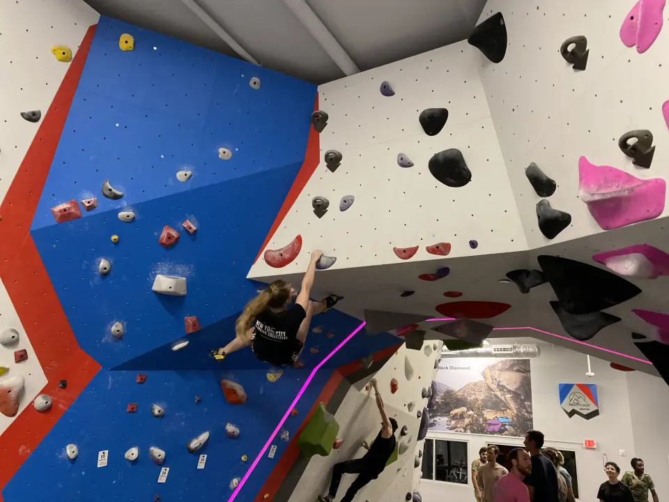Climbers on the overhanging boulders