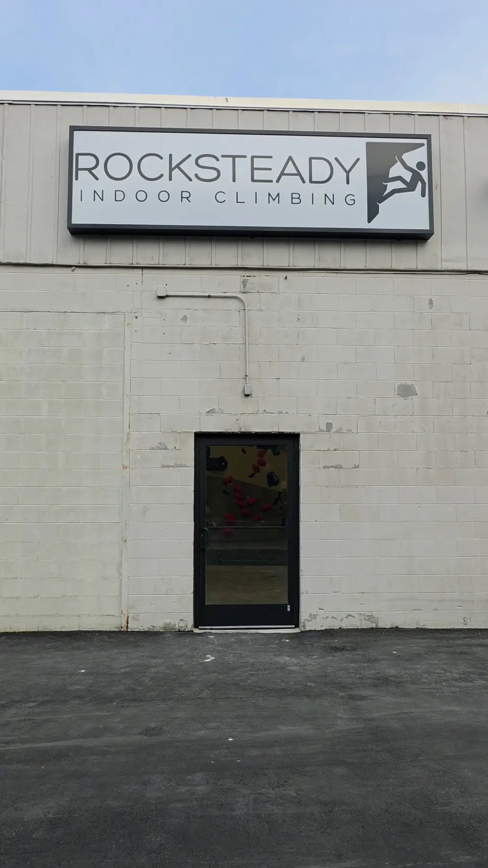 Rocksteady Indoor Climbing sign over the entrance at the rear of the building