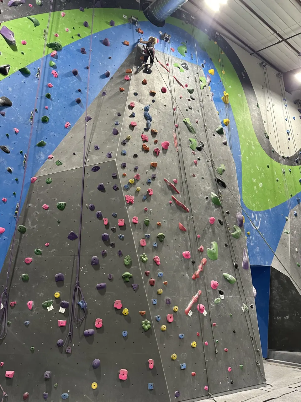 Tall grey arête with routes on both sides