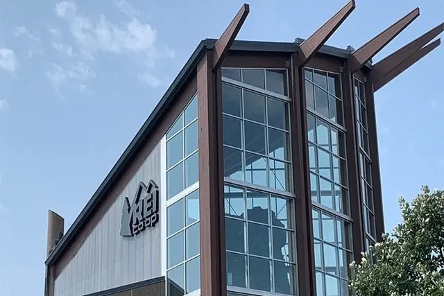 The glass tower of REI's Bloomington flagship store