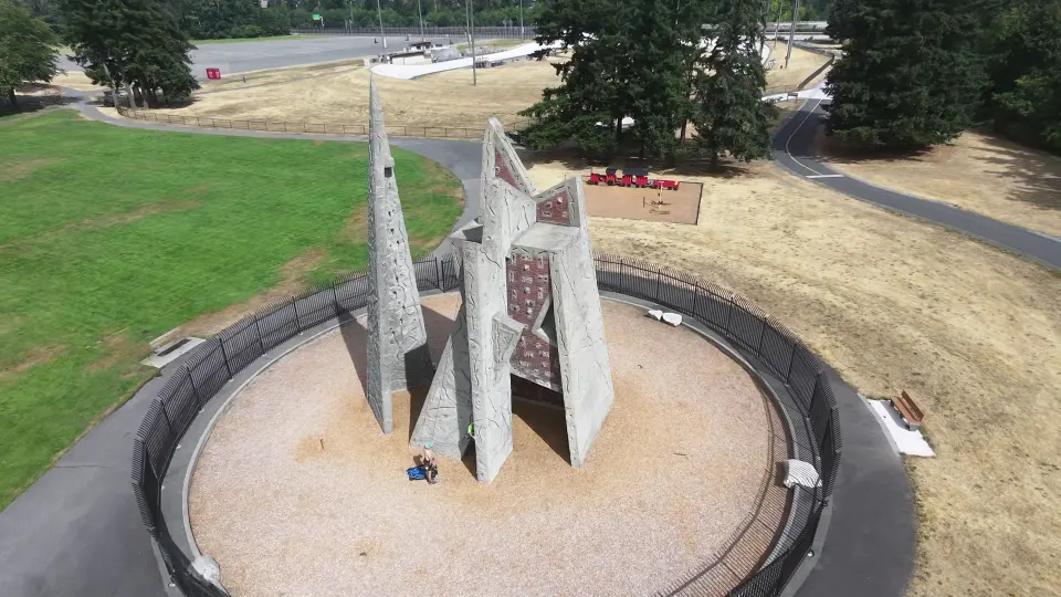 Aerial view of the spires inside their fenced wood-chip circle