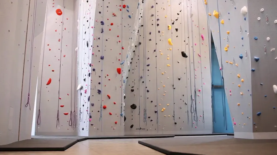 Row of top-rope lines on the tall walls