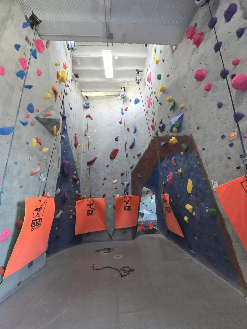 Top-rope walls with orange auto-belay gates