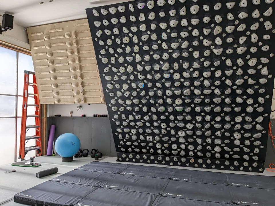 The Kilter Board and training corner with crash mats