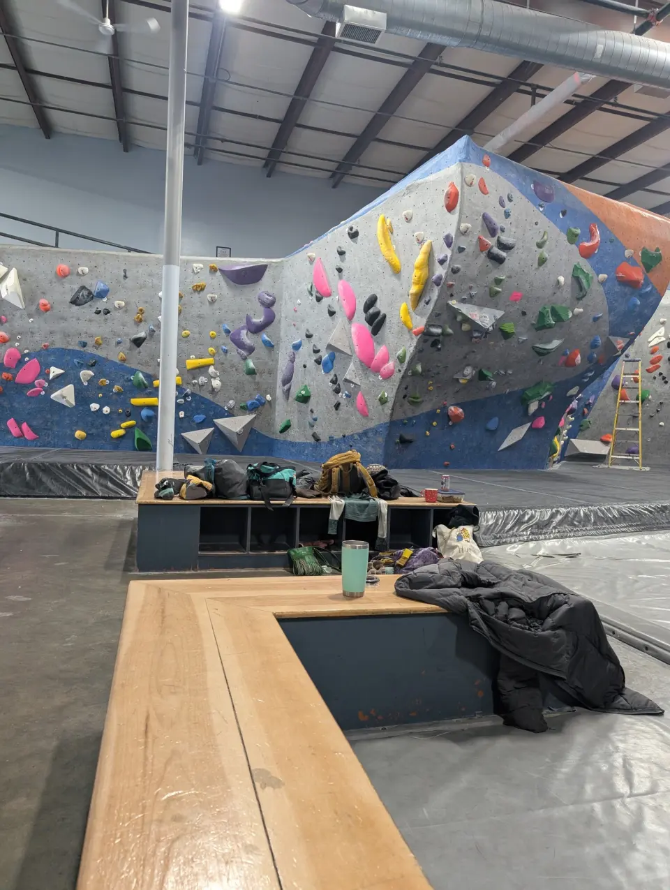 Bouldering wall seen from the benches by the cubbies