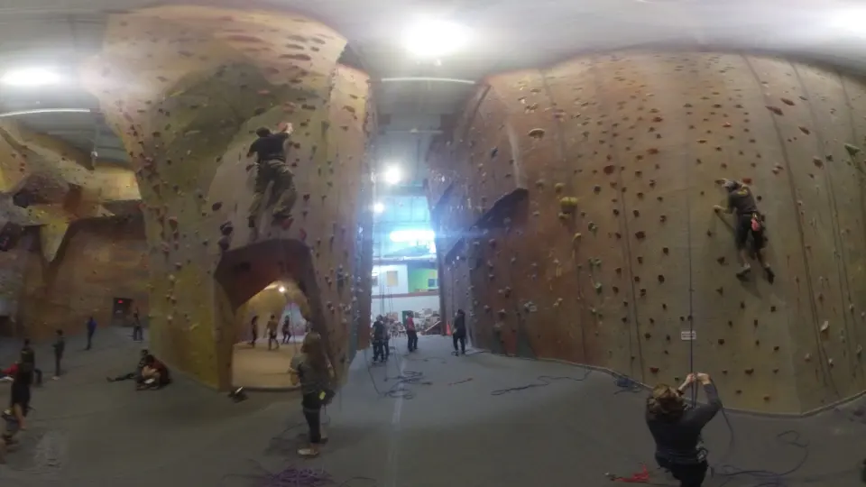 Climbers and belayers in the main roped hall