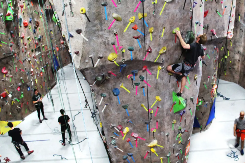 Climbers on the tall top-rope walls seen from above