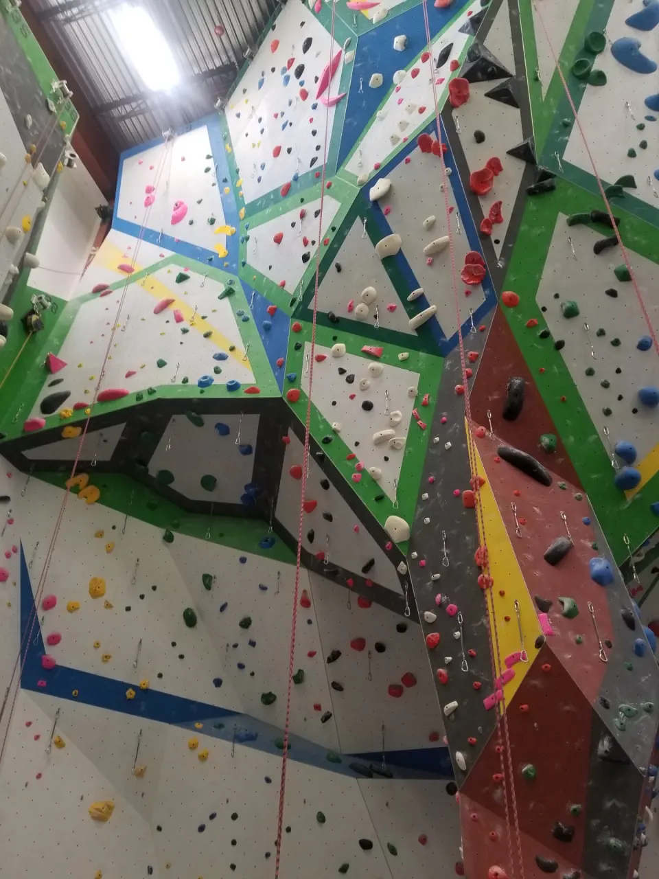 Rope wall split into colourful angled panels