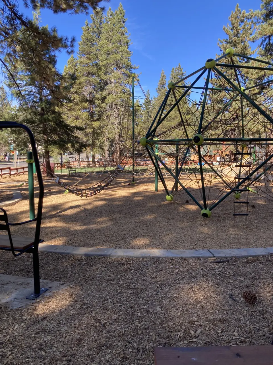 Rope climbing dome in the park's play area