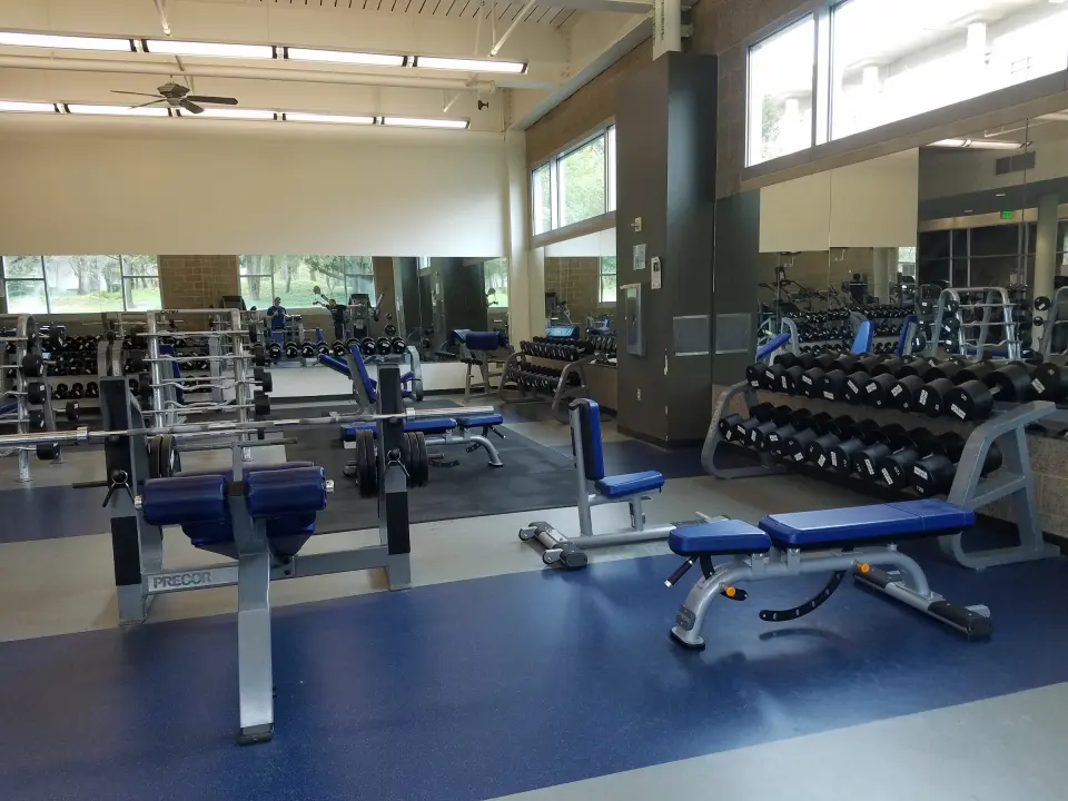 Weights and benches in the Recreation Center fitness centre