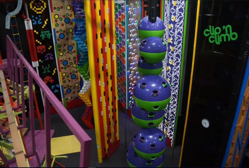 The Astroball climb among the colourful challenge walls