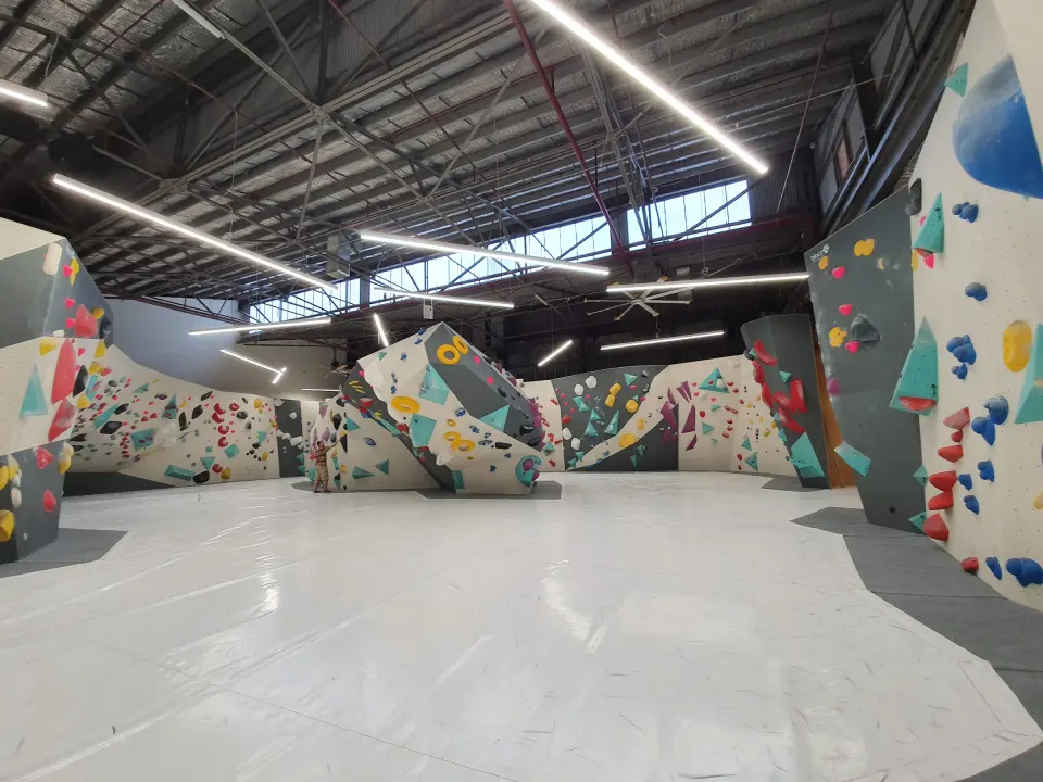 Main bouldering hall with padded floors and walls on every side