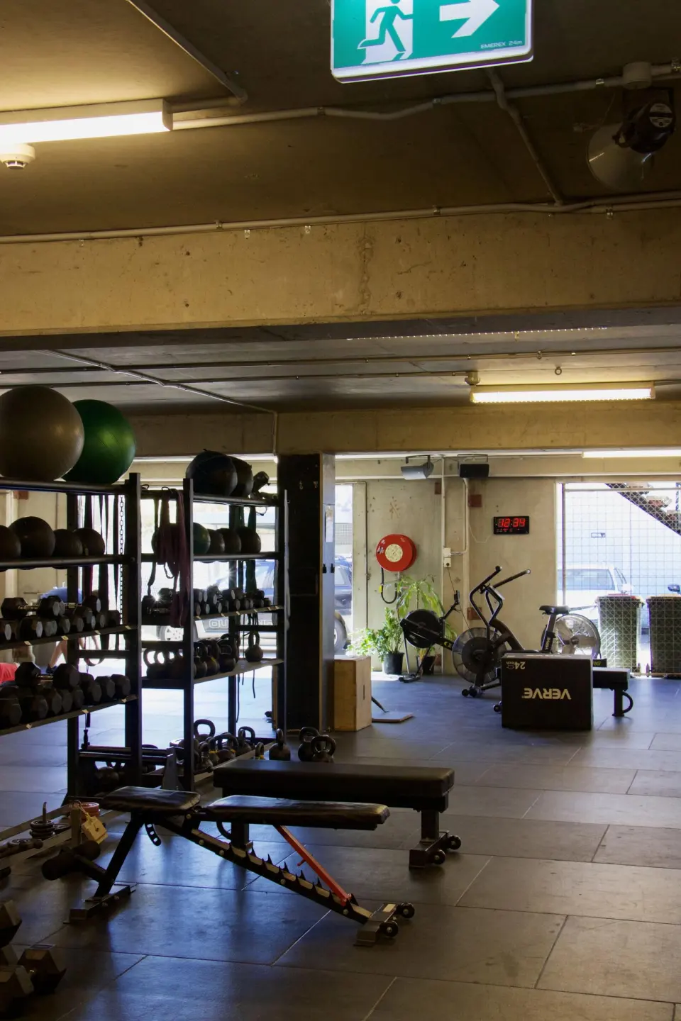 The Dungeon fitness gym, with dumbbells, benches and air bikes