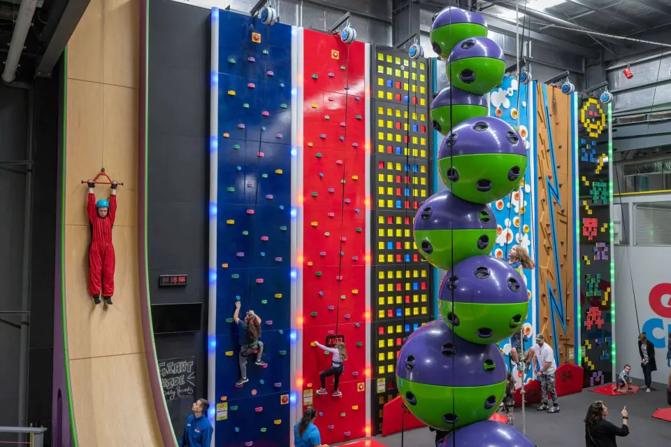 Clip 'n Climb walls, stacked spheres and the giant slide in the Climbing Arena