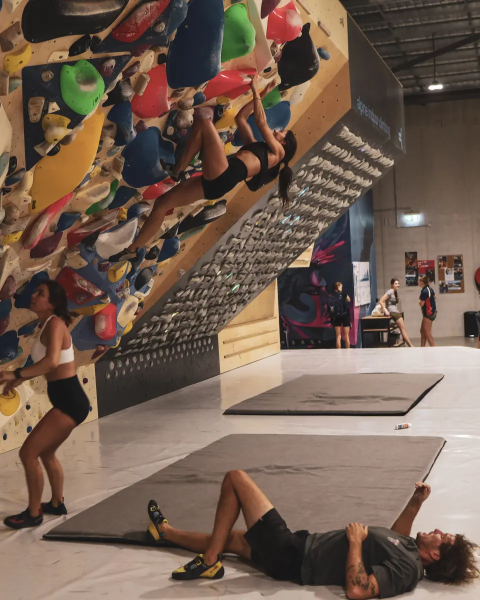 Climbers on the steep training board
