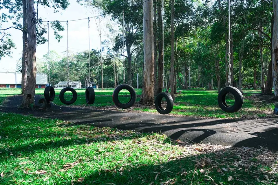 Tyre swings and low ropes course among the gum trees