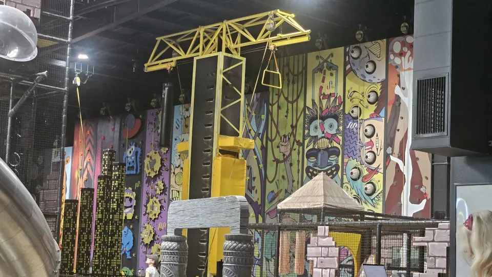 Climbing walls and the yellow crane tower in the play hall