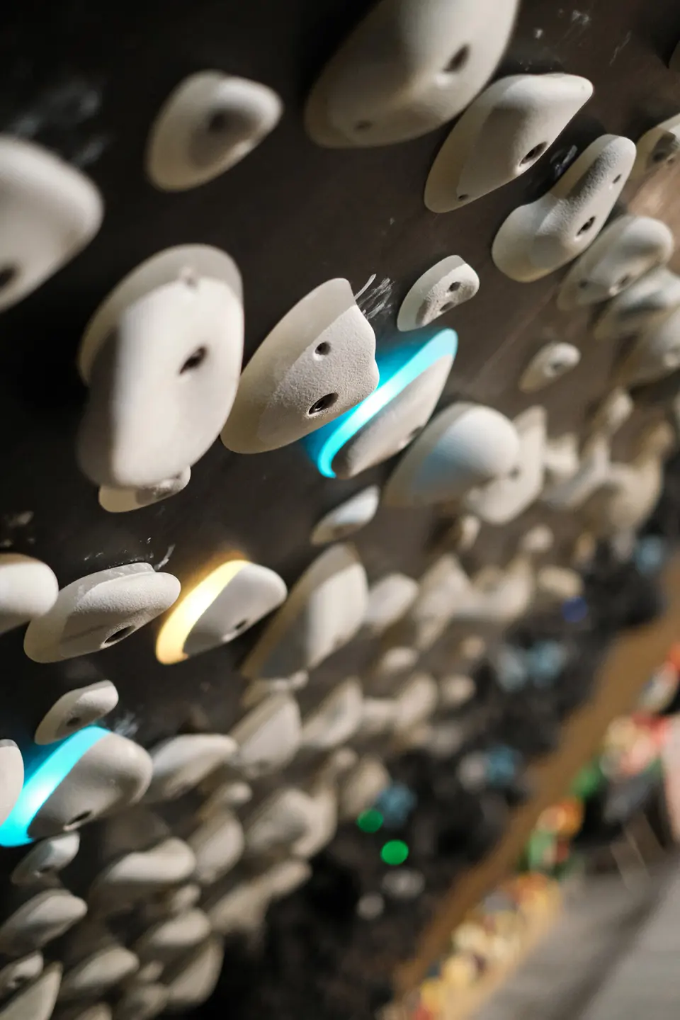 Kilter Board holds lit by their LEDs