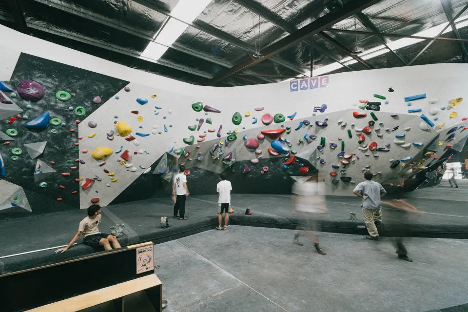 Climbers in the main hall beside the overhanging Cave