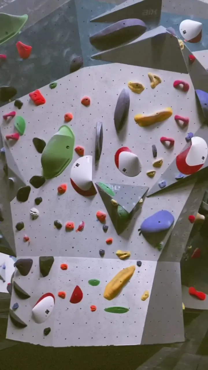 Close-up of a wall set with colourful holds