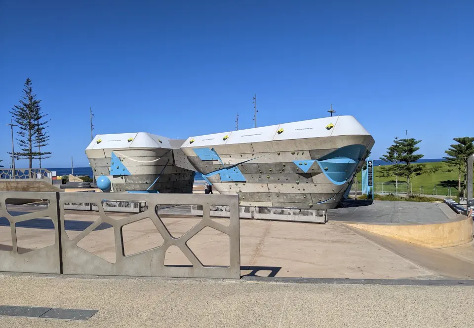 The two bouldering blocks of the Snake Pit seen across the foreshore plaza