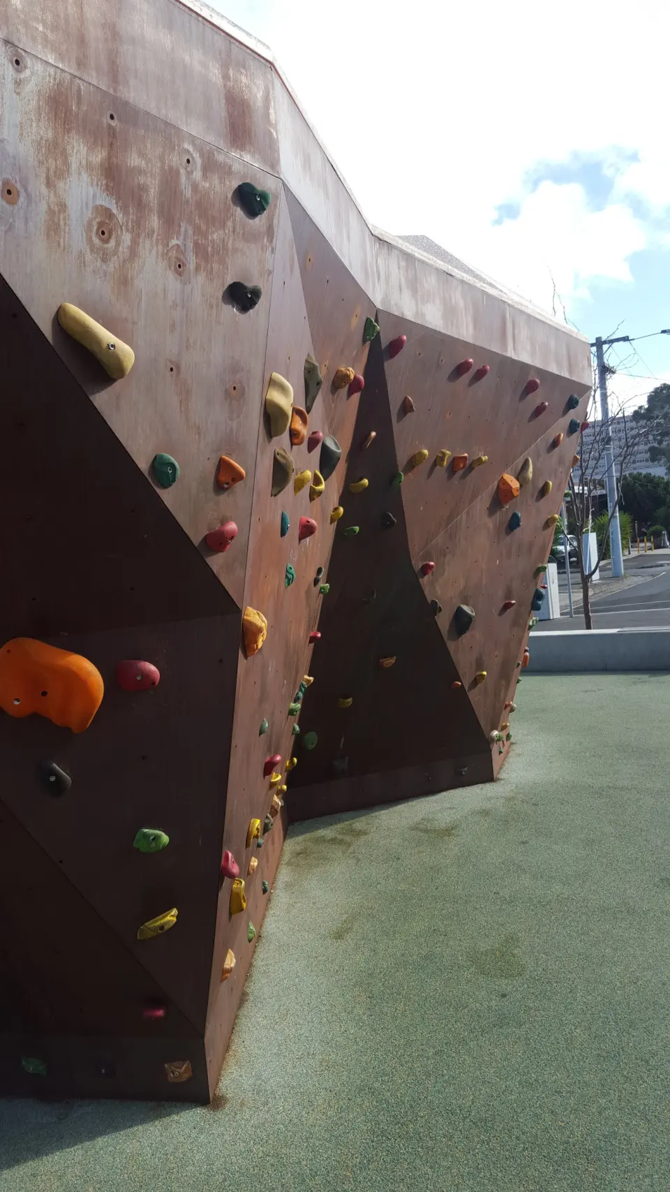 Angled faces of the boulder, set with coloured holds