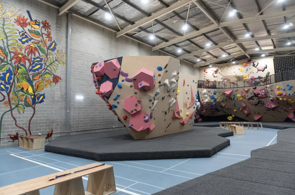 The island boulder and mezzanine walls at Rock It Derwent Park, a bouldering gym in Hobart