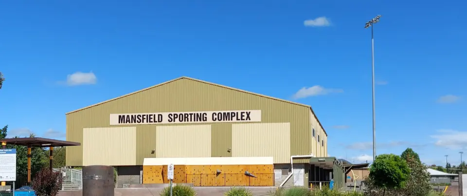 The Mansfield Sporting Complex, with the climbing wall's orange panels along the base of its front