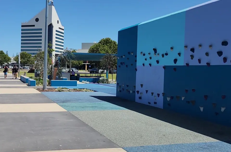 The end and side panels of the climbing wall, with Bunbury Tower behind
